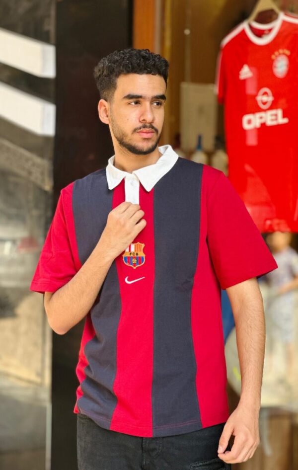 ⁦تيشرت بولو برشلونه مقلم⁩ - الصورة ⁦8⁩